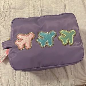 Stoney Clover Lane Purple Travel Bag with Airplane Patches